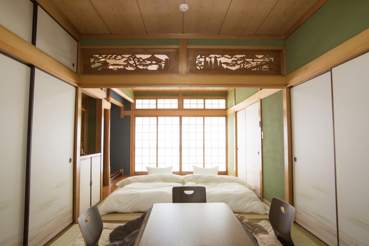 Guest House Dougo-Yado Matsuyama  Bagian luar foto